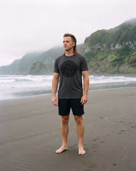 Model wearing humbl Aroha t-shirt in Asphalt Marle